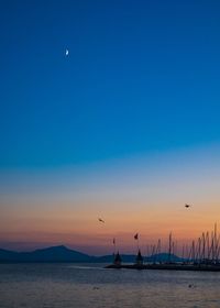 Scenic view of sea against sky at sunset