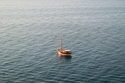 High angle view of sailboat sailing on sea