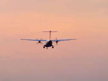 Low angle view of airplane flying in sky