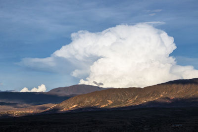 Scenic view of volcanic landscape against sky