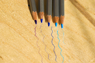 High angle view of colored pencils on table