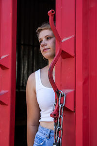 Portrait of young woman looking away