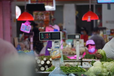 Rear view of woman holding food