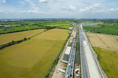 High angle view of road amidst buildings against sky