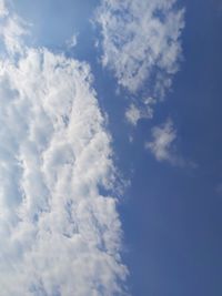 Low angle view of clouds in blue sky