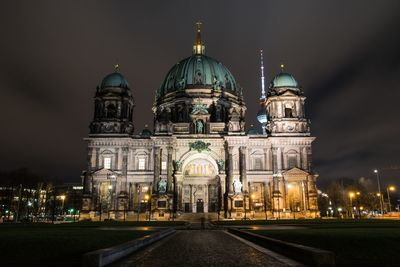Low angle view of illuminated berlin cathedral against sky at night
