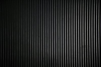 Full frame shot of metal grate against wall