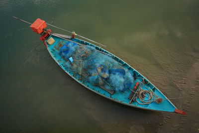 High angle view of boat moored on river