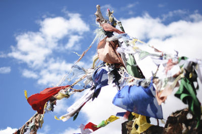 Low angle view of statues against sky