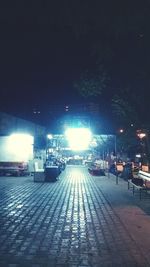 Illuminated street lights at night
