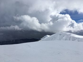 Scenic view of snow against sky