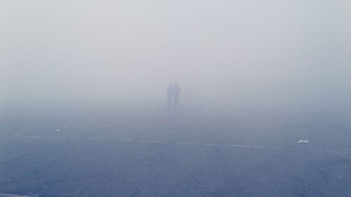 Scenic view of landscape during foggy weather