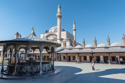 View of temple building against clear blue sky