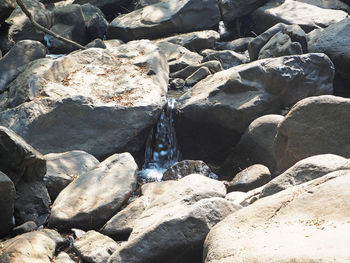 High angle view of stones on beach