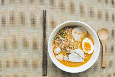 Directly above shot of soup served on table