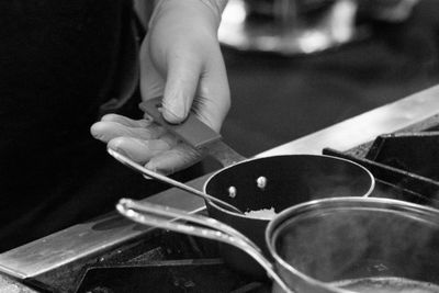 Close-up of man playing guitar