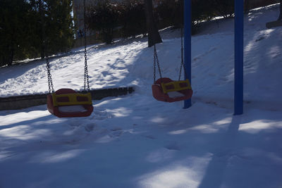 View of swing in winter