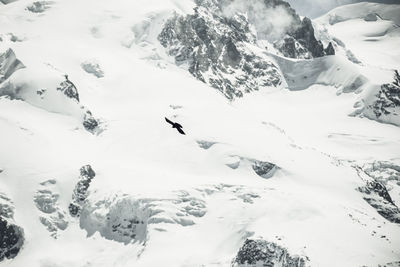 Scenic view of snow covered mountains