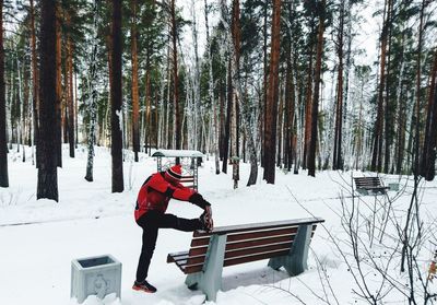 Man on snow covered field