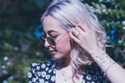 Close-up of woman looking away outdoors