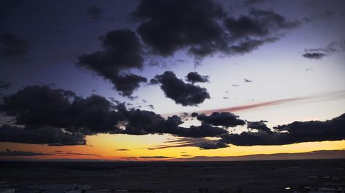 Scenic view of dramatic sky during sunset