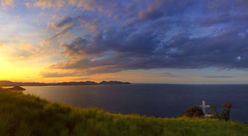 Scenic view of sea against cloudy sky