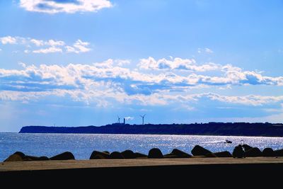 Scenic view of sea against blue sky