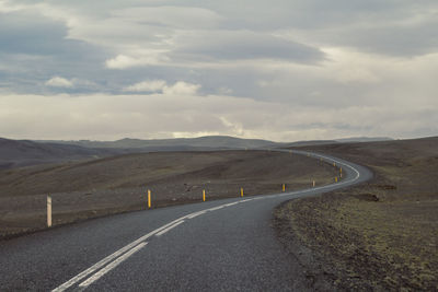 Empty road across hills landscape photo