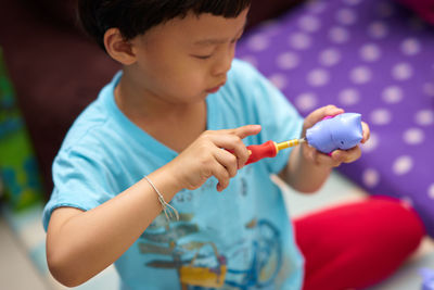 Boy playing with toy