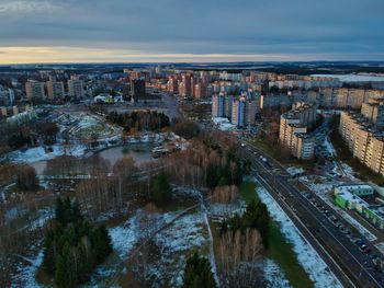 High angle view of buildings in city against sky