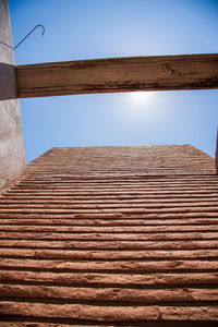 Low angle view of building against blue sky