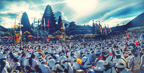 Group of people in temple against building