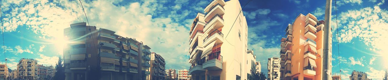 Low angle view of built structure against blue sky