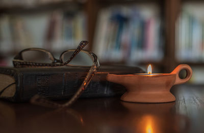 Close-up of candles on table