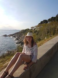 Portrait of young woman on beach