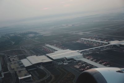 Aerial view of cityscape against sky