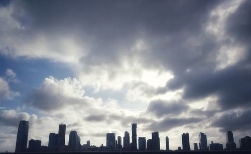 Modern buildings against sky in city