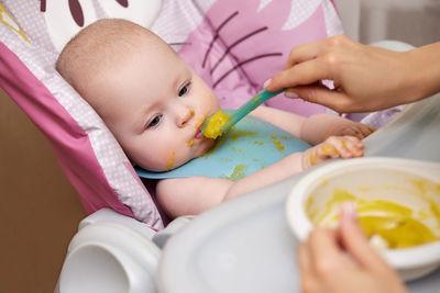 Close-up of boy eating food