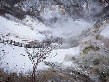 High angle view of snowcapped mountains during winter
