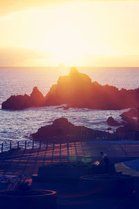 Scenic view of sea against sky during sunset