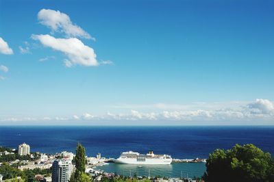 Scenic view of sea against blue sky