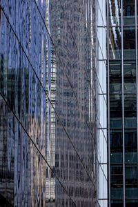 Low angle view of modern buildings in city