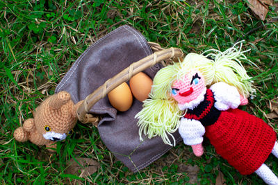 High angle view of stuffed toy in basket