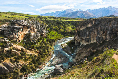 Landscape with mountain range in background