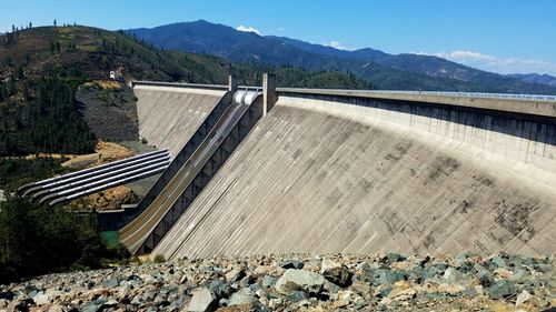 High angle view of dam against mountains