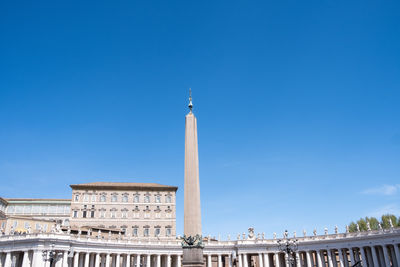 Low angle view of monument against clear blue sky