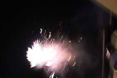 Firework display at night