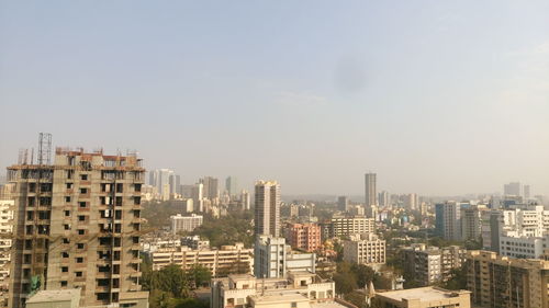 Scenic view of cityscape against sky