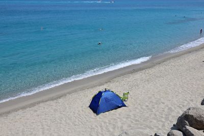 High angle view of umbrella on beach