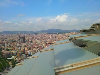 Aerial view of cityscape against sky